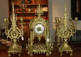 19th century French, gilded brass Gothic revival clock garniture.