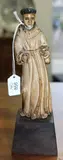 18th Century, A good ivory figure of St Anthony mounted on a wooden plinth.