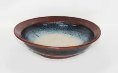 Large circular stoneware bowl by Len Castle, sold Oct 2012