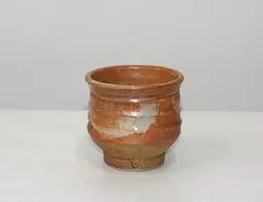 Stoneware cup by Warren Tippett, sold May 2012