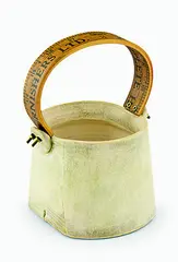 Stoneware white glazed vase with mounted tailor tape measure handle in wood. Impressed mark. by Chris Weaver, offered May 2012