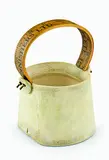 Chris Weaver, Stoneware white glazed vase with mounted tailor tape measure handle in wood. Impressed mark.