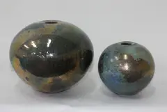 Two silver lustre forms, by Ray Rogers, sold May 2012