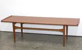 Edvart Kindt-Larsen, A Danish coffee table with rectangular top raised on tapering legs.