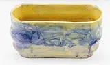 Briar Gardner, Trough vase decorated in blue, purple and yellow glazes. Signed to base.