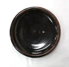 Stoneware plate by Len Castle, offered May 2012