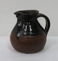 Stoneware jug by Jeff Scholes, sold May 2012