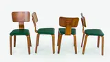 Garth Chester, A rare set of four plywood side chairs with original upholstery.