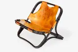 Rohe Noorwolde, Easy chair made in Holland. African style stained cane and natural leather upholstery.