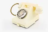White 1950's Bakelite phone, pull out number tray and chrome dial, in excellent condition