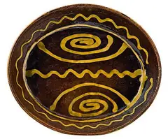 Oval slipware dish by Winchcombe Pottery, sold Jun 2011