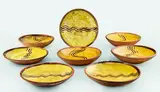 Winchcombe Pottery, Eight slipware dishes