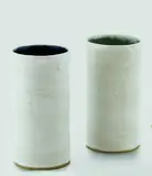 Dame Lucie Rie, A pair of stoneware white tin glazed beakers