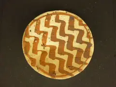 Circular terracotta disc by Richard Parker, sold Jun 2011