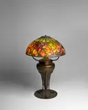 Woodbine Table Lamp by Tiffany Studios, leaded glass and patinated bronze, shade stamped 'TIFFANY STUDIOS NEW YORK', sold Dec 2022