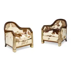 Pair of Armchairs by French Art Deco, calf hide upholstery, walnut, silvered wood, offered Oct 2022