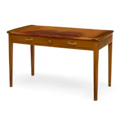 Desk by Eugène Printz, from the Cite Universitaire, mahogany, with brass handles and brown leather top, sold Oct 2022