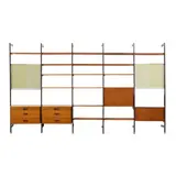 Comprehensive Storage System (CSS) by George Nelson & Associates, for Herman Miller, walnut, enameled aluminum, aluminum, and enameled steel, sold Oct 2022