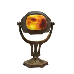 Turtleback Zodiac Desk Lamp by Tiffany Studios, patinated bronze, Favrile glass, sold Jul 2022
