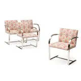 Set of Four Brno Chairs by Ludwig Mies van der Rohe, for Knoll, steel, later upholstered with tribal patterned fabric seats and solid tan color fabric seat backs, offered Jul 2022