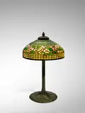 'Dogwood' Table Lamp by Tiffany Studios, leaded glass, patinated bronze, shade stamped 'TIFFANY STUDIOS NEW YORK', base stamped 'TIFFANY STUDIOS NEW YORK 553', sold Jun 2022
