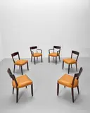 Jules Leleu, Dining suite, East India rosewood, nickel plated steel, leather upholstery