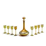 Tiffany Studios, Decanter and Stopper with Eight Cordials, engraved Favrile glass with grape and grapeleaf design, decanter etched 'L