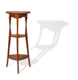 Three-Tiered Sellette by Louis Majorelle, mahogany, sold Mar 2022