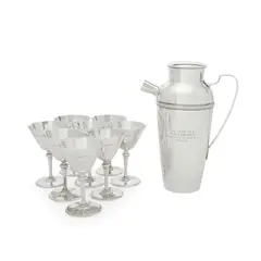 Tiffany & Co., Nine Piece Cocktail Set, sterling silver, comprising a shaker and eight martini glasses, shaker engraved 'THE GOOD SHIP MANCHONOCH CLARENCE H