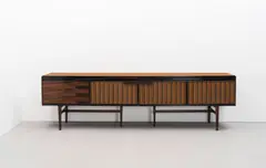 David Powell, Unique 'Heal's' two-part sideboard, designed 1964, Brazilian rosewood, ebony, fabric upholstered doors