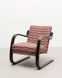 Cantilevered armchair, model no. 34/402, designed 1933 by Alvar Aalto, Birch-laminated bent plywood, fabric upholstery, sold Oct 2022