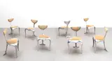 Mark Brazier-Jones, Set of eight 'Dolphin' chairs, designed 1990, executed 1998, Cast and polished aluminium, fabric upholstery