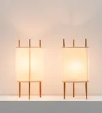 Isamu Noguchi, Pair of 'Three-Legged Cylinder' table lamps, model no. 9, circa 1947, Cherry, fibreglass polyvinyl