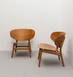 Two 'Shell' chairs, model no. FH1936, designed in 1948, produced 1948-mid 1950s by Hans J. Wegner, Walnut-veneered plywood, beech, sold Oct 2022