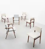 Franco Albini, Set of four 'Luisella' chairs, model no. SD9, and pair of 'Luisa' armchairs, circa 1955, Walnut, fabric upholstery, painted steel