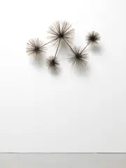 Wall-mounted sculpture by Curtis Jeré, 1979, Brass, sold Apr 2022