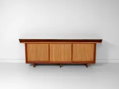George Nakashima, Triple Sliding-Door Cabinet, American black walnut, pandanus