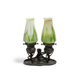 Rare Electrified Two Light Candle Lamp by Tiffany Studios, patinated bronze, Favrile glass, sold Oct 2021