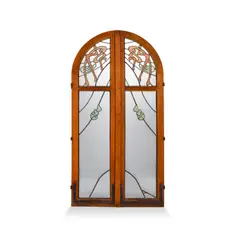 Pair of Doors by Hector Guimard, from the Castel Beranger, Paris, leaded glass, oak, sold Oct 2021
