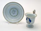 Meissen, Tasse mit Reliefporträt Luthers und Untertasse, Porzellan, blau und gold staffiert