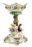 Tafelaufsatz 'Vier Jahreszeiten' auf Sockel by Meissen, Porzellan, farbig und gold staffiert, sold May 2015