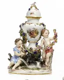 Ziervase mit spielenden Putten by Meissen, Porzellan, farbig und gold staffiert, sold May 2015