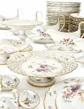 Aus einem großen Speiseservice mit reichem Blumendekor und Insekten by Meissen, sold May 2015