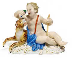 Putto mit Leopard by Meissen, Porzellan, farbig und gold staffiert, sold May 2016