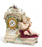 Pendule mit Amor by Meissen, Porzellan, farbig und gold staffiert, sold May 2016