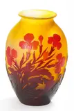 Kleine Vase mit floralem Dekor by Émile Gallé, Farbloses Glas, gelb hinterfangen, sold May 2016