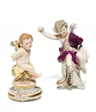 2 Amoretten by Meissen, Porzellan, farbig und gold staffiert, sold May 2017