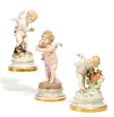 3 Amoretten by Meissen, Porzellan, farbig und gold staffiert, sold May 2017