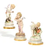 3 Amoretten by Meissen, Porzellan, farbig und gold staffiert, sold May 2017