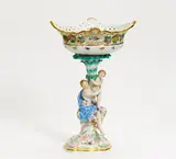 Figürlicher Tafelaufatz by Meissen, Porzellan, farbig und gold staffiert, sold Jan 2020